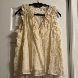 Sleeveless ruffled shirt